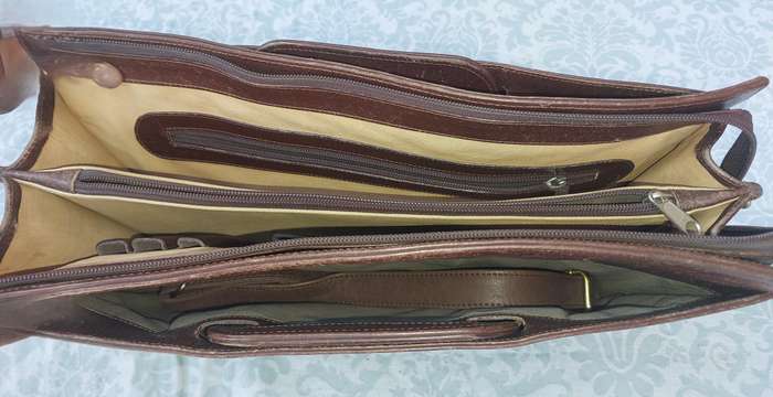 A GENUINE LEATHER EXECUTIVE BRIEFCASE BURGUNDY BROWN MADE IN ARGENTINA SOLD AS IS