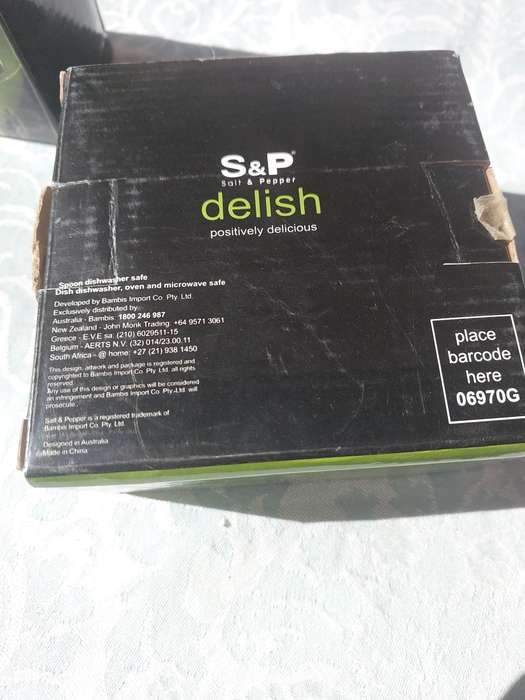 TWO DELISH S A & P OLIVE DISHES WITH SPOONS SOLD AS IS
