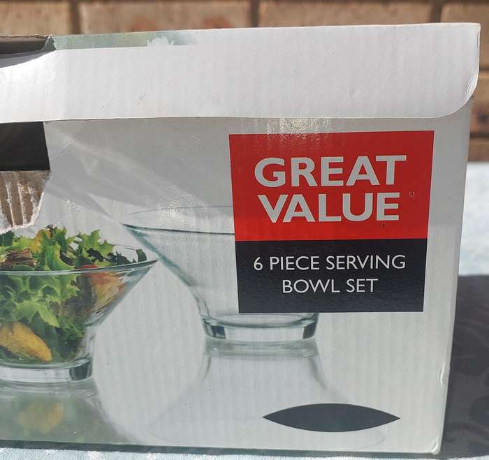 A SET OF 6 GLASS  SERVING BOWLS SOLD AS IS