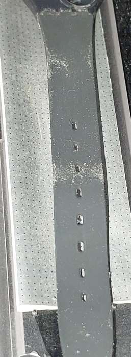 A UNISEX SWATCH RUBBER WATCH MISSING THE BATTERY COVER SOLD AS IS NOT TESTED