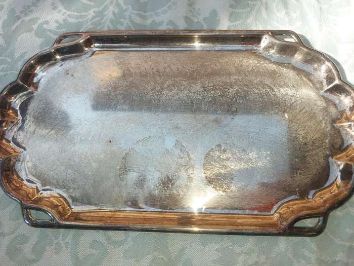 TWO ANTIQUE SERVING TRAYS SILVER PLATED SOLD AS IS