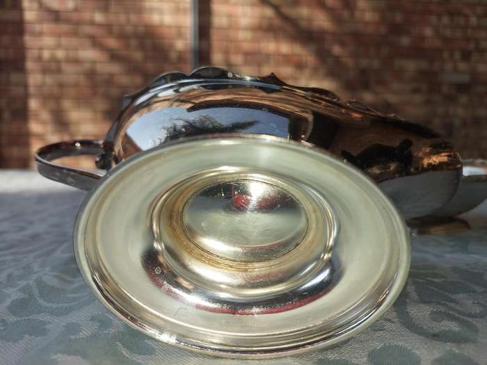 TWO VINTAGE UTENSILS A SAUCE BOAT AND A BUTTER DISH SOLD AS IS