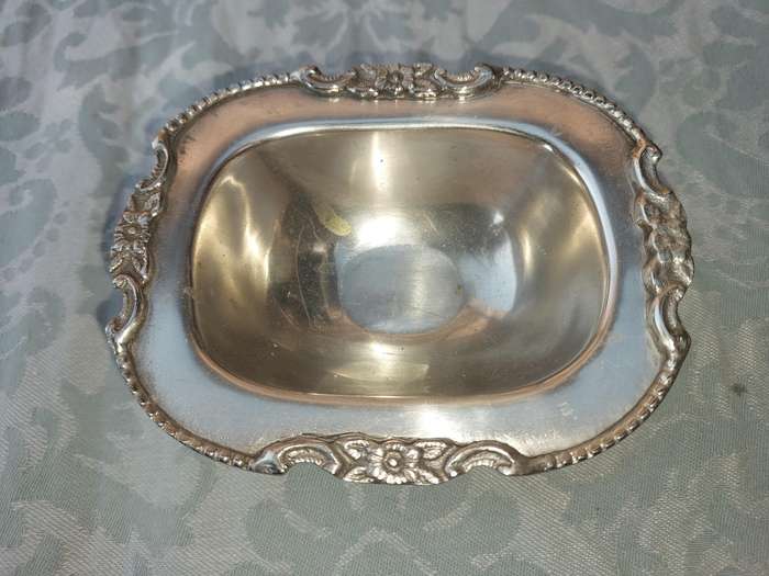 TWO VINTAGE UTENSILS A SAUCE BOAT AND A BUTTER DISH SOLD AS IS