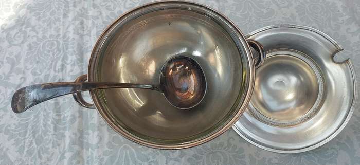A VINTAGE TUREEN AND A GLASS INSERT BOWL WITH A LADEL SOLD AS IS