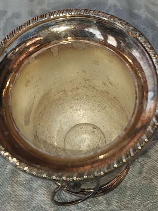 A COLLECTION OF5 LION HEAD TOOTH PIK HOLDERS SOLD AS IS SILVER PLATED