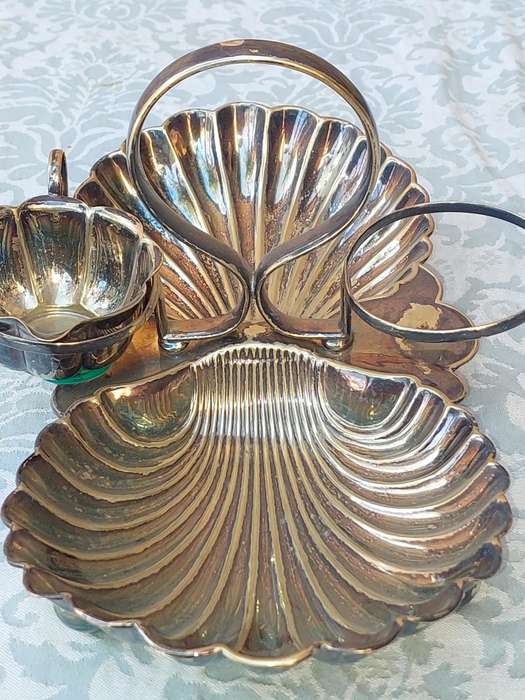 A VINTAGE BRIDAL BAROQUE SERVER FOOTED SOLD AS IS