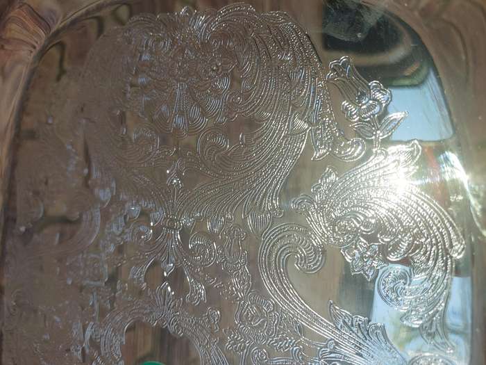 A NEVER USED SILVER PLATED RECTANGULAR SERVING TRAY SOLD AS IS