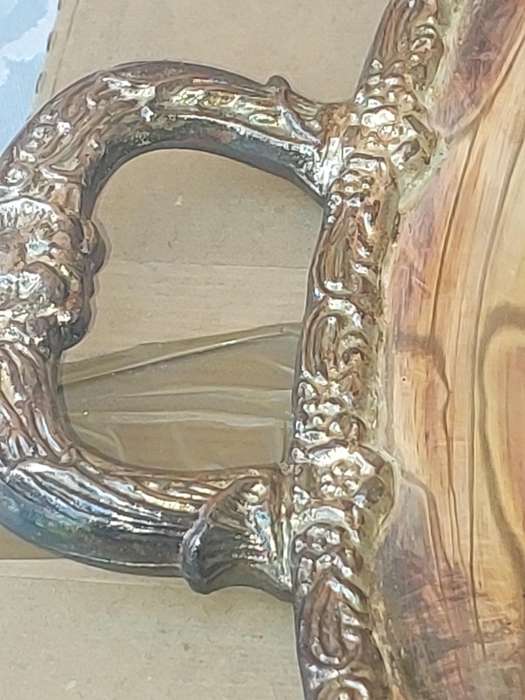 A NEVER USED SILVER PLATED RECTANGULAR SERVING TRAY SOLD AS IS