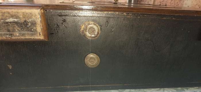 AN ANTIQUE PADESTAL CLOCK WITH THE WINDING KEYS MADE IN ENGLAND AND CHIMES SOLD AS IS