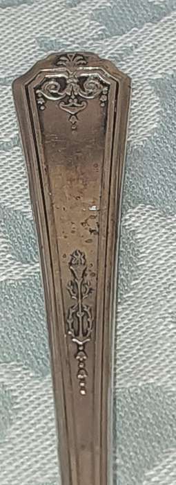 A VINTAGE SET OF STAINLESS STEEL CUTLERY SOLD AS IS