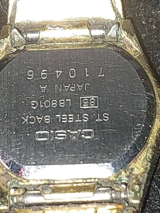 A VINTAGE PULSAR AND A DIGITAL GOLD PLATED CASIO WOMANS WATCHES SOLD AS IS