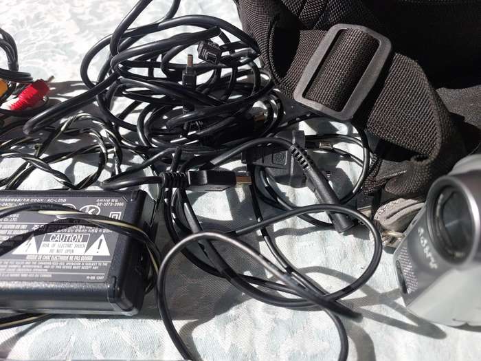 A SONY MODEL DCR-HC32E DIGITAL VIDEO CAMERA RECORDER IN WORKING ORDER WITH ALL CABLES , BATTERY AND