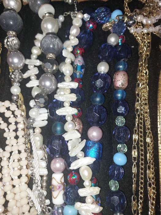 A VINTAGE COLLECTION OF COSTUME NECKLACES SOLD AS IS