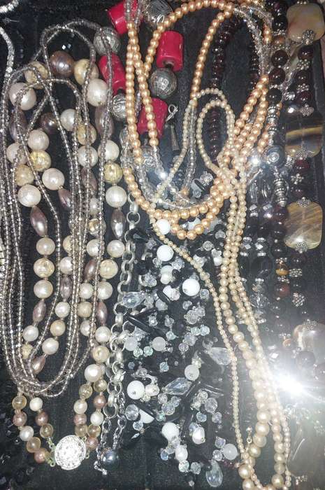 A COLLECTION OF QUALITY COSTUME NECKLACES SOLD AS IS