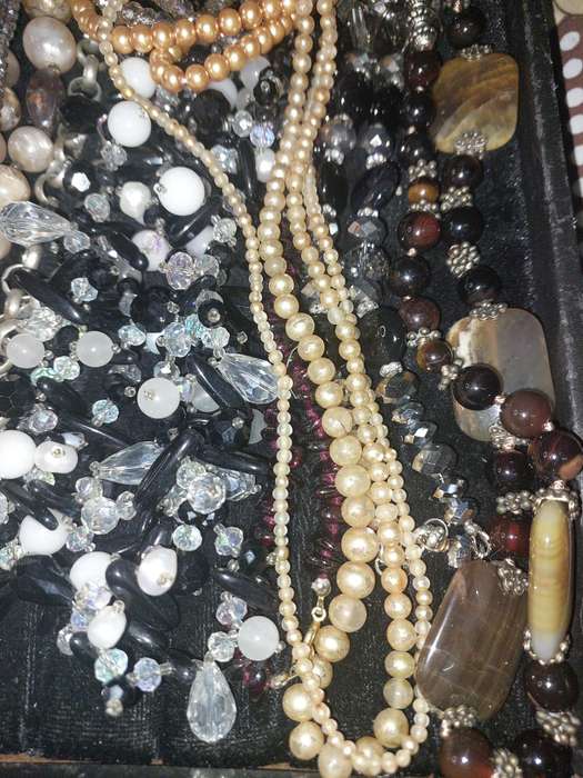 A COLLECTION OF QUALITY COSTUME NECKLACES SOLD AS IS