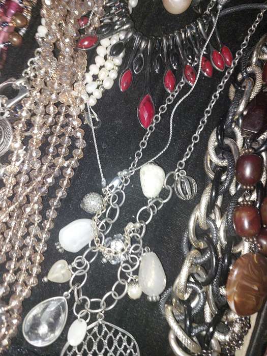 A COLLECTION OF COSTUME NECKLACES SOLD AS IS