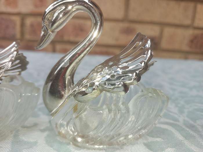 A set of 3 Swan Salt Cellars with out  Spoons Silver Plate vintage sold as is