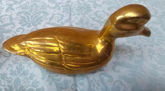 TWO SOLID BRASS DUCKS  SOLD AS IS