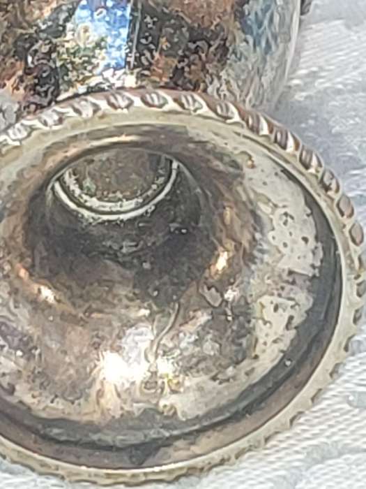 A VINTAGE SILVER PLATED SALT AND PEPPER SHAKERS SOLD AS IS