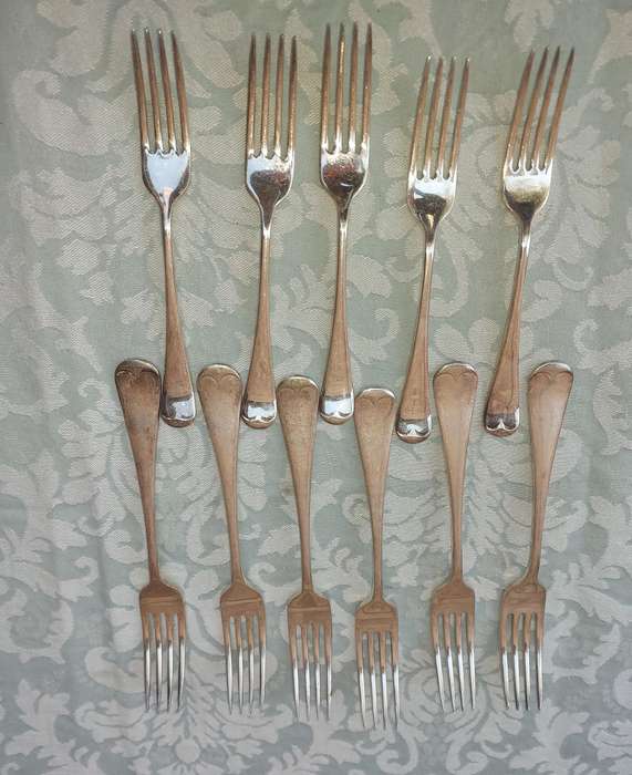 A VINTAGE SET OF 11 EPNS A1 FORKS SOLD AS IS
