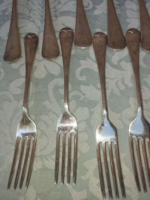 A VINTAGE SET OF 11 EPNS A1 FORKS SOLD AS IS