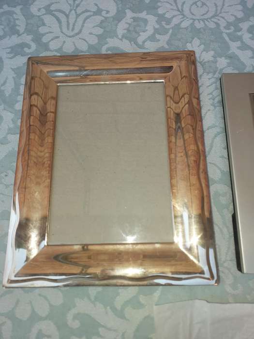 A COLLECTION OF PHOTO FRAMES SOLD AS IS
