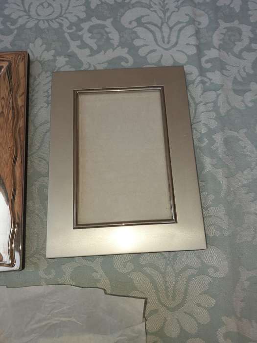 A COLLECTION OF PHOTO FRAMES SOLD AS IS