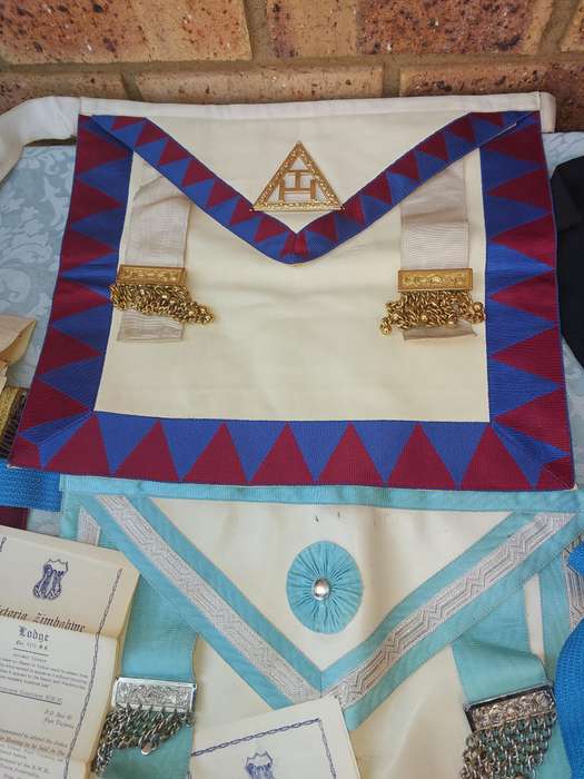 A COLLECTION OF MAISONIC RAGALIA AND BOOKS ,THE LODGE, SOLD AS IS