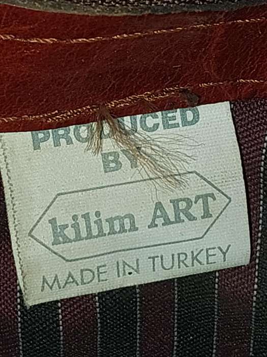 A BEATIFULL LEATHER WITH EMBROIDED ART WORK NAPSAK MADE BY KILIM ART IN TURKEY