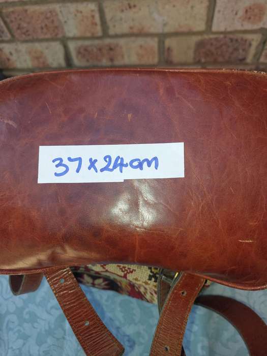 A BEATIFULL LEATHER WITH EMBROIDED ART WORK NAPSAK MADE BY KILIM ART IN TURKEY