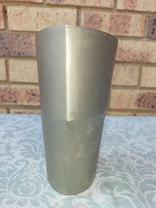 A20 CENTIMETER IN HIEGHT METAL VASE SOLD AS IS R