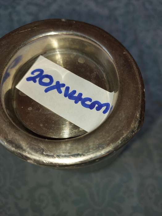 A20 CENTIMETER IN HIEGHT METAL VASE SOLD AS IS R