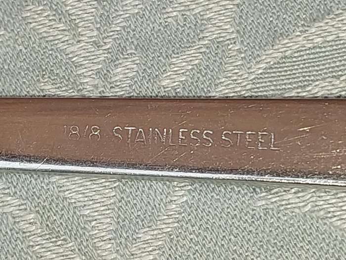 A SET OF 22 , 18/8 CUTLERY SOLD AS IS