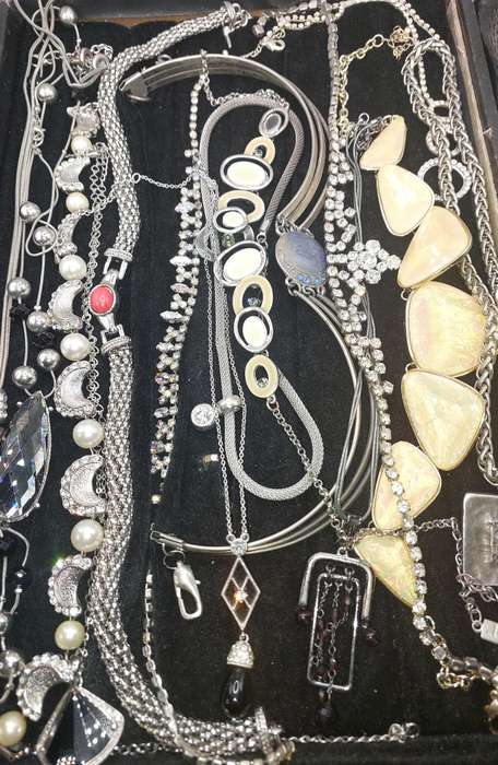 A QUALITY COLLECTION OF SILVER PLATED AND STAINLESS STEEL NECKLACES SOME WITH CRYSTALS SOLD AS IS