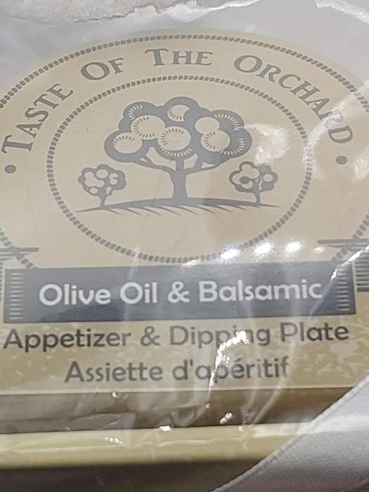 AN OLIVE OIL AND BALSAMIC APERTIZER DIPPING PLATE SOLD AS IS