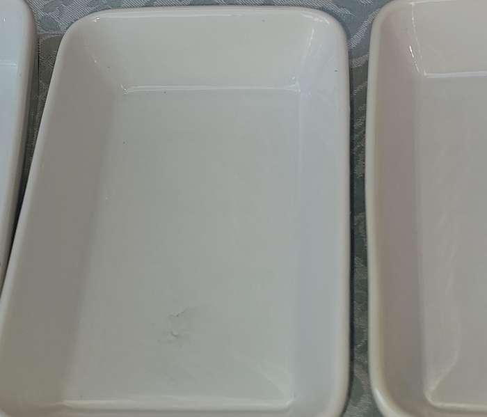 A COLLECTION OF 4 LAZANIA PORCELAIN BOWLS SOLD AS IS