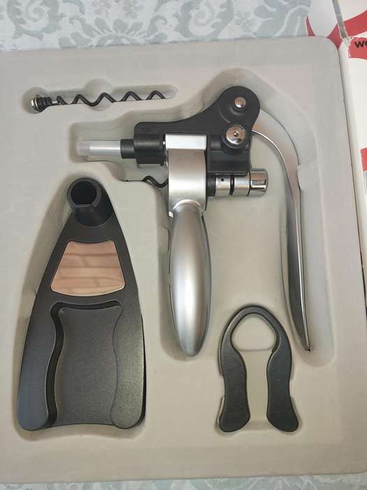 A WINE SCREW PULL SET BY WOOLWORTHS SOLD AS IS