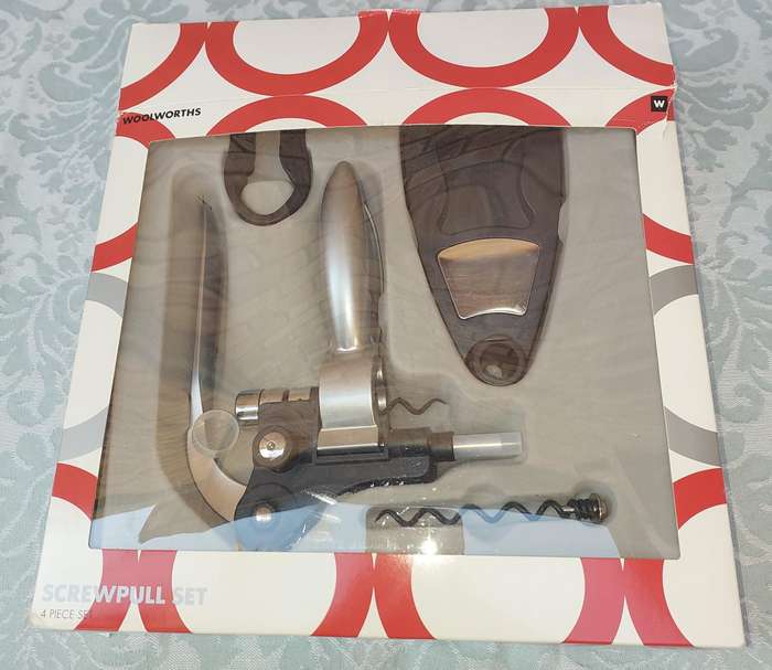 A WINE SCREW PULL SET BY WOOLWORTHS SOLD AS IS