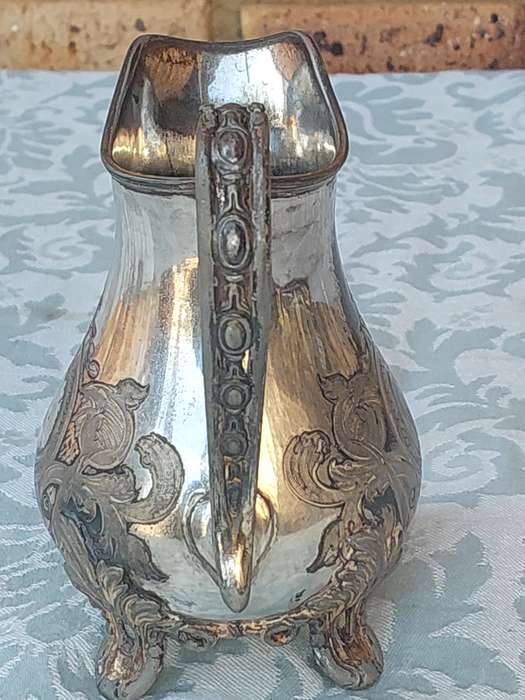 AN ANTIQUE DICKSON AND SONS SHEFFIELD ENGRAVED JUG SOLD AS IS