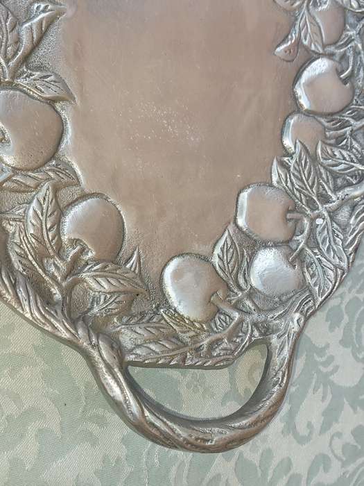 AN OVAL PEWTAL SERVING PLATTER SOLD AS IS