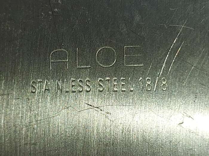 TWO STAINLESS STEEL SERVING PLATTERS SOLD AS IS