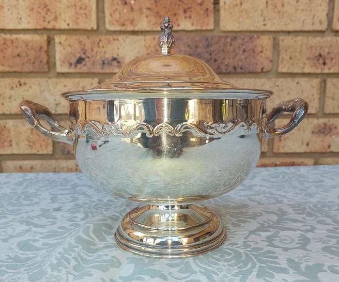 A SIVERPLATED TUREEN SOLD AS IS