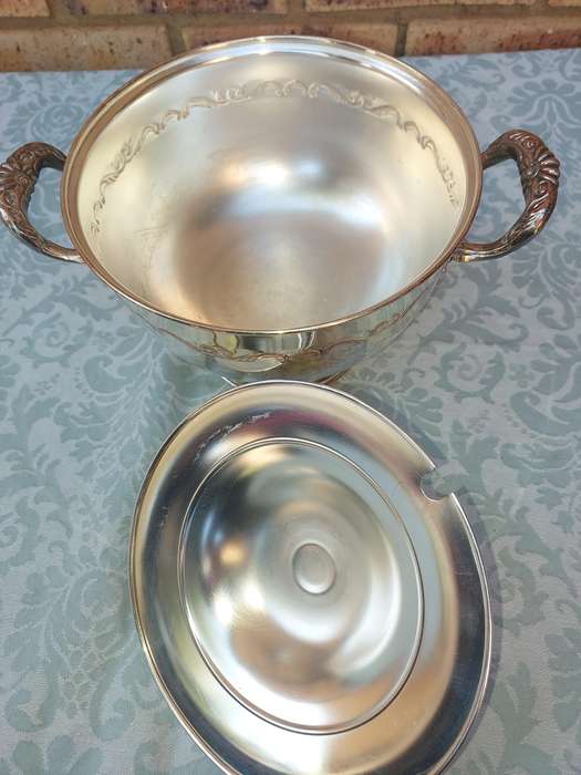 A SIVERPLATED TUREEN SOLD AS IS
