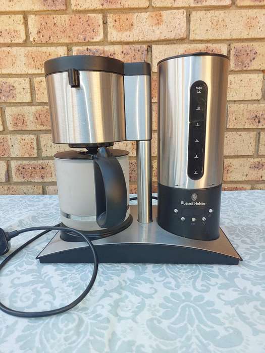 A RUSSEL HOBBS COFFEE MAKER IN WORKING CONDITION SOLD AS IS