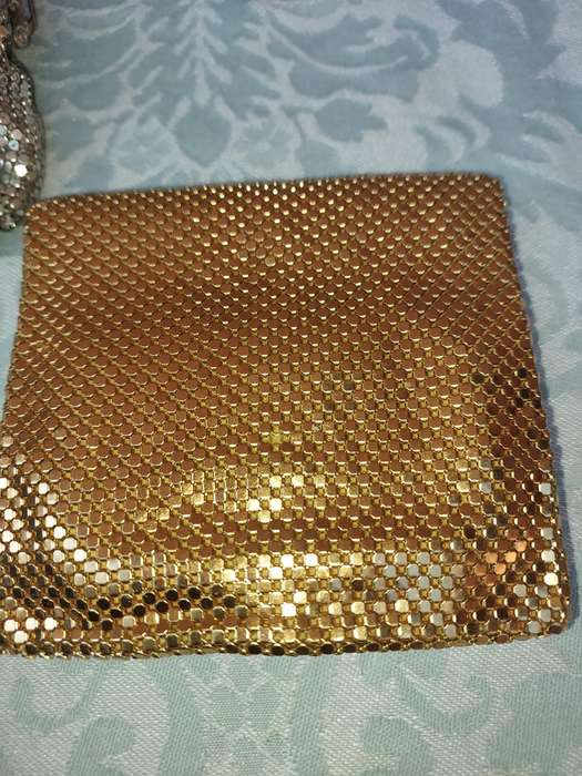 A COLLECTION OF HAND BAGS AND PURSES SOLD AS IS