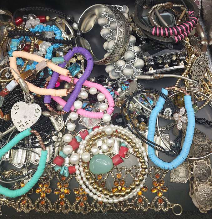 A BULK COLLECTION COSTUME BRACELETS SOLD AS IS