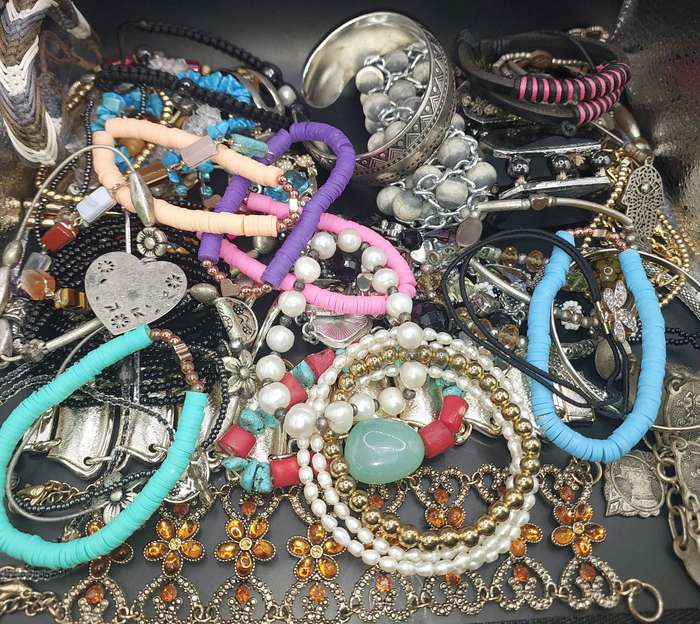 A BULK COLLECTION COSTUME BRACELETS SOLD AS IS