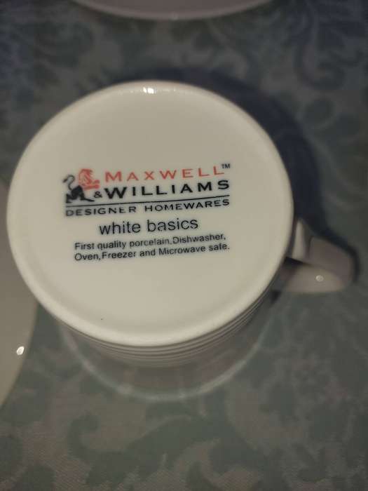 A COLLECTION OF 11 TRIOS MAXWELL AND WILLIAMS BASIC WHITE PORCELAIN SOLD AS IS