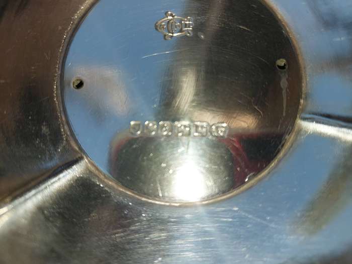 A COLLECTION OF SILVERPLATED AND STAINLESS STEEL WEDDING BASKET SERVING TRAYS
