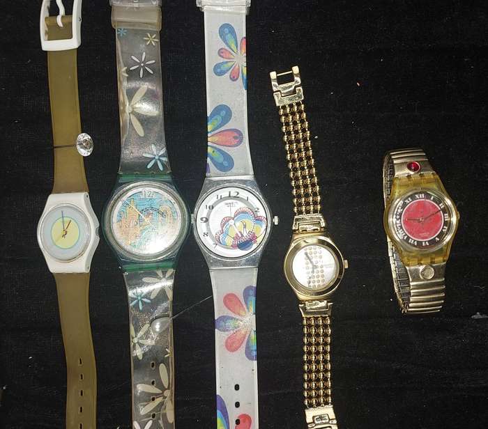 A COLLECTION OF SWATCH WATCHES  SOLD AS IS
